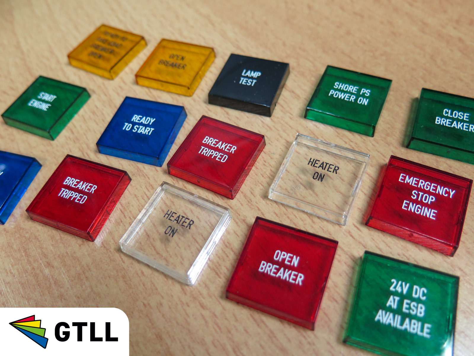 Graveren van lenzen en drukknoppen