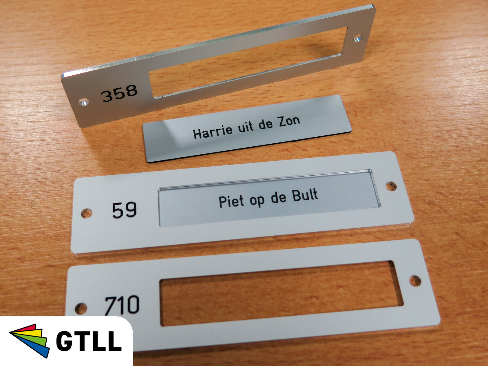 Losse houders voor naamplaatjes